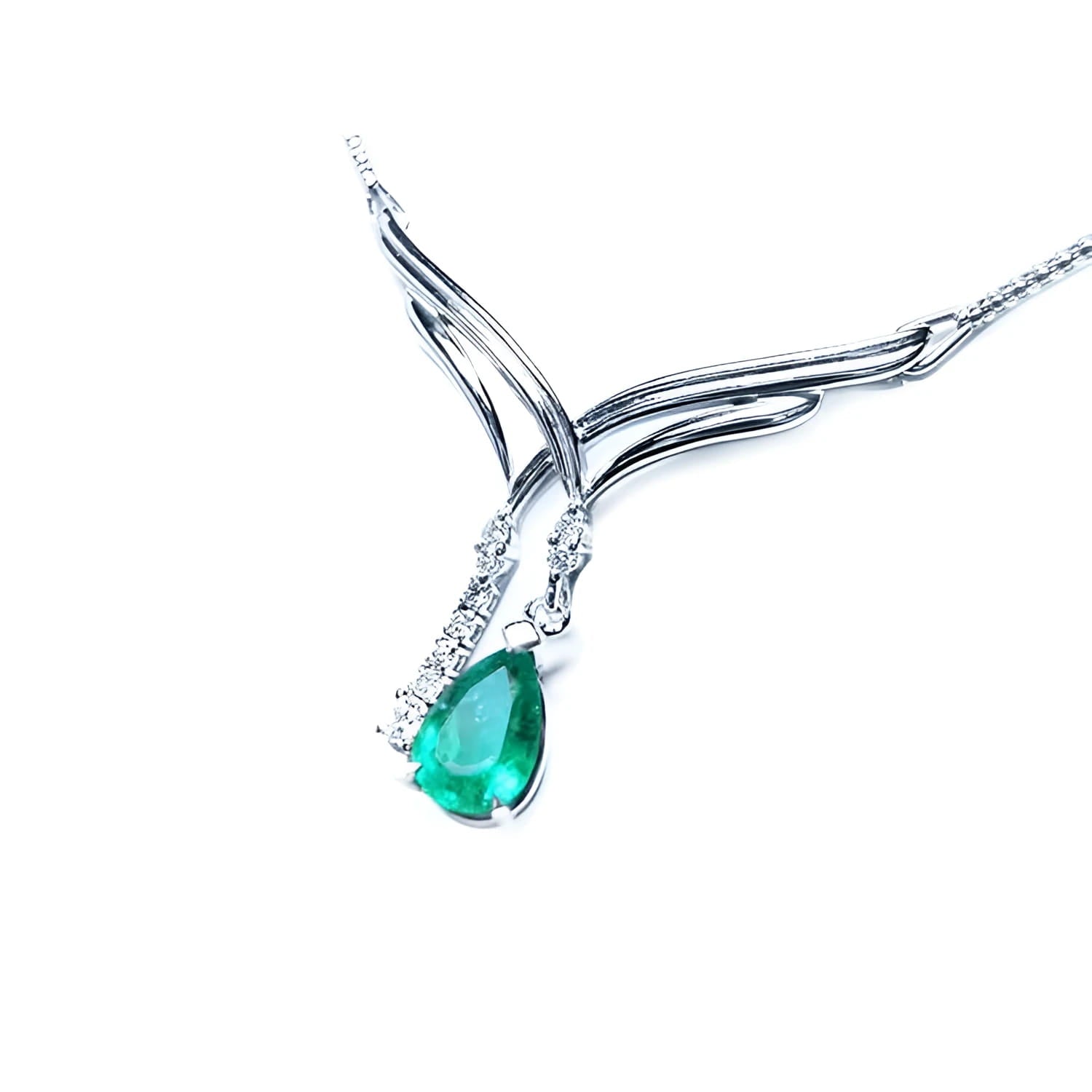 14K white gold necklace with a pear-shaped emerald and diamond chevron design.