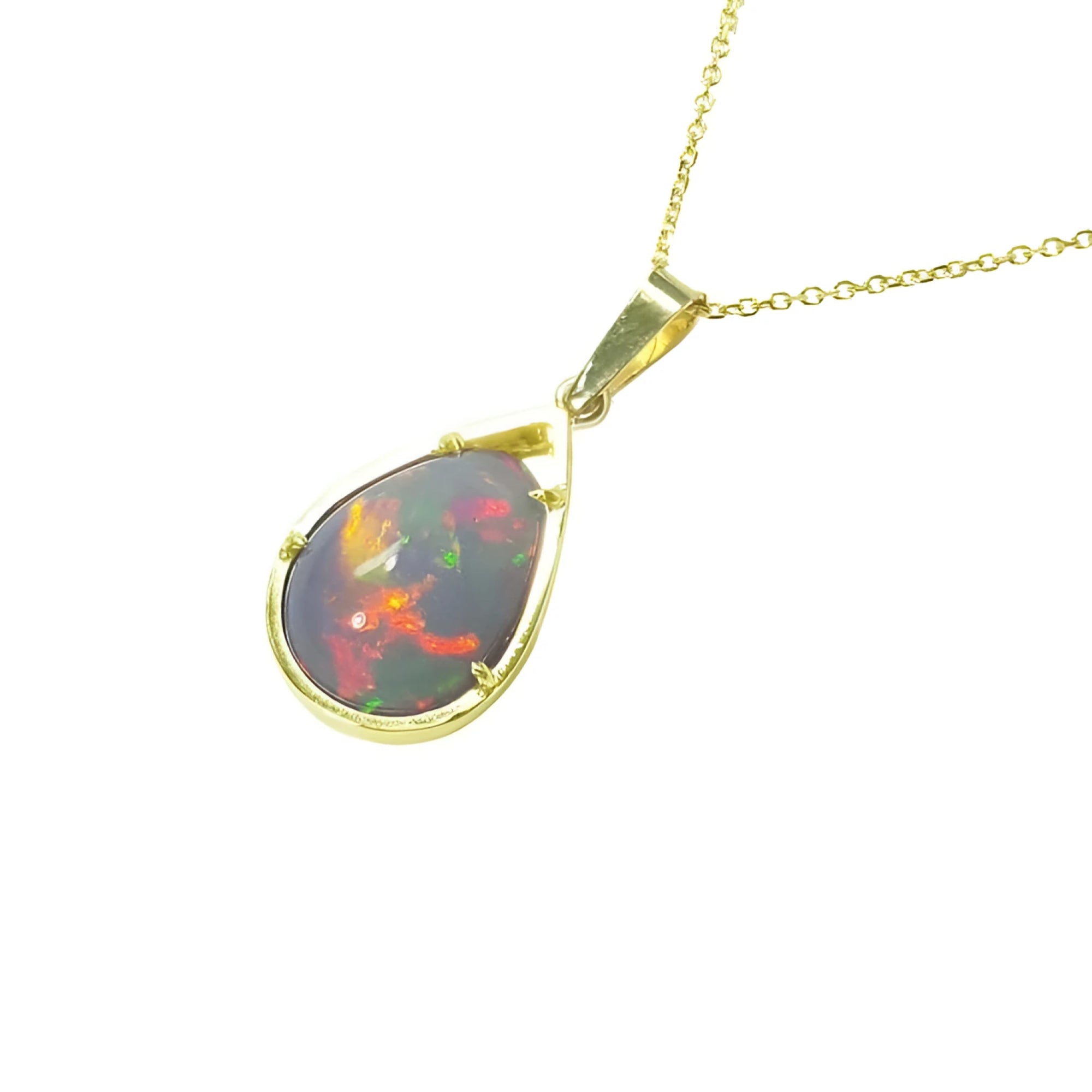 Pear-shaped Ethiopian Welo opal pendant with fiery red-orange play of color, set in 14K yellow gold.