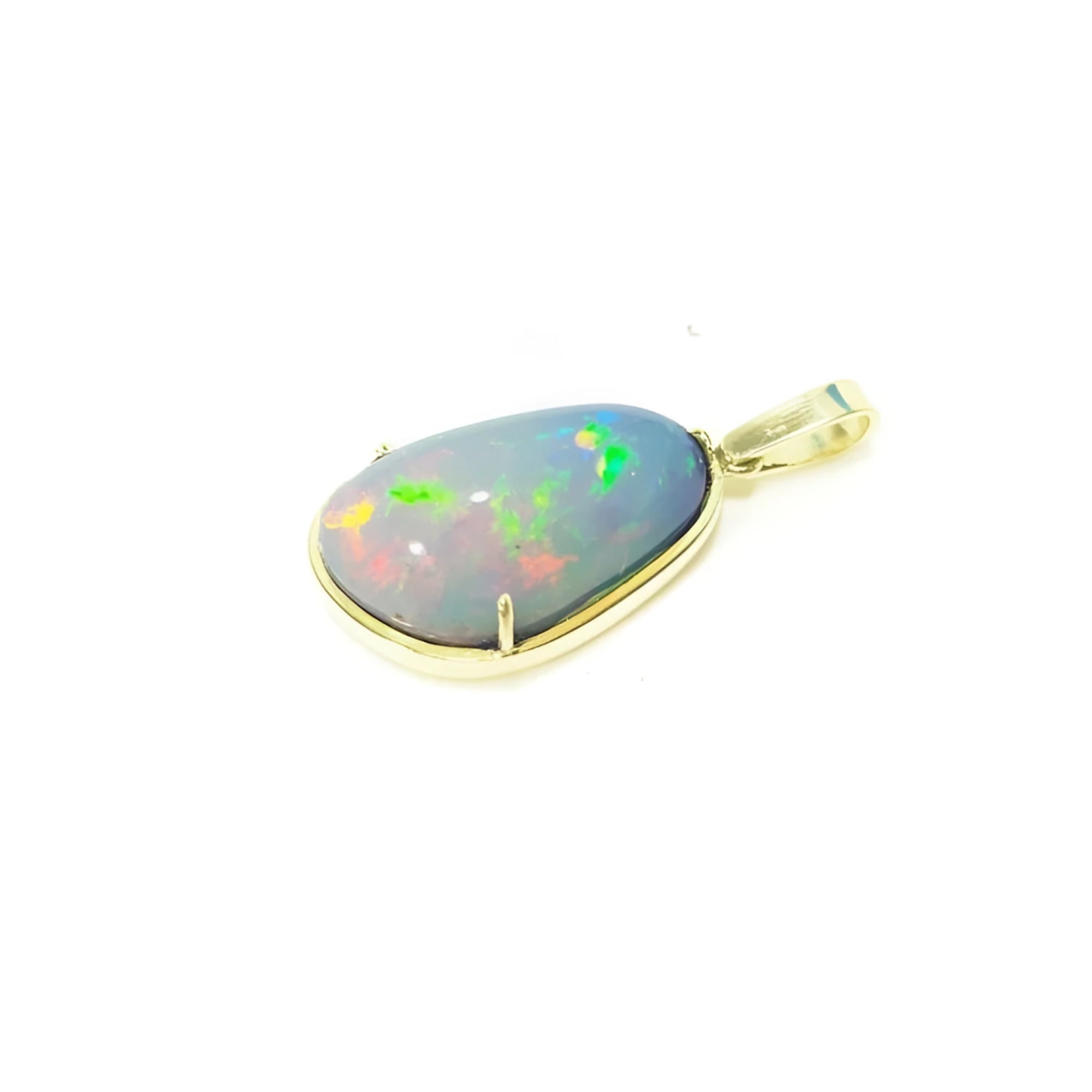 Teardrop Ethiopian opal pendant with rainbow flashes, set in 14K yellow gold.