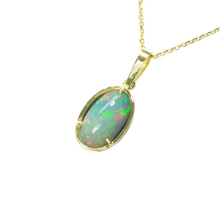 Oval Ethiopian opal pendant with bluish-green hues, prong-set in 14K yellow gold on a delicate chain.