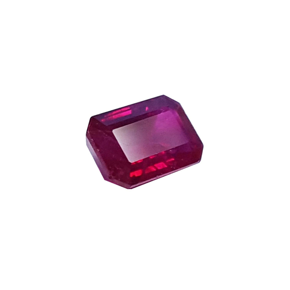 Loose natural ruby emerald cut from Burma 1.08 ct. right side position table and crown visibles