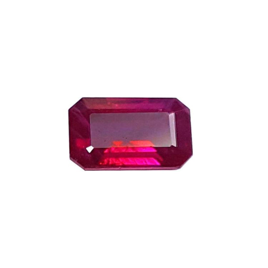 1.08 carat emerald cut Burma ruby with deep rich red color.