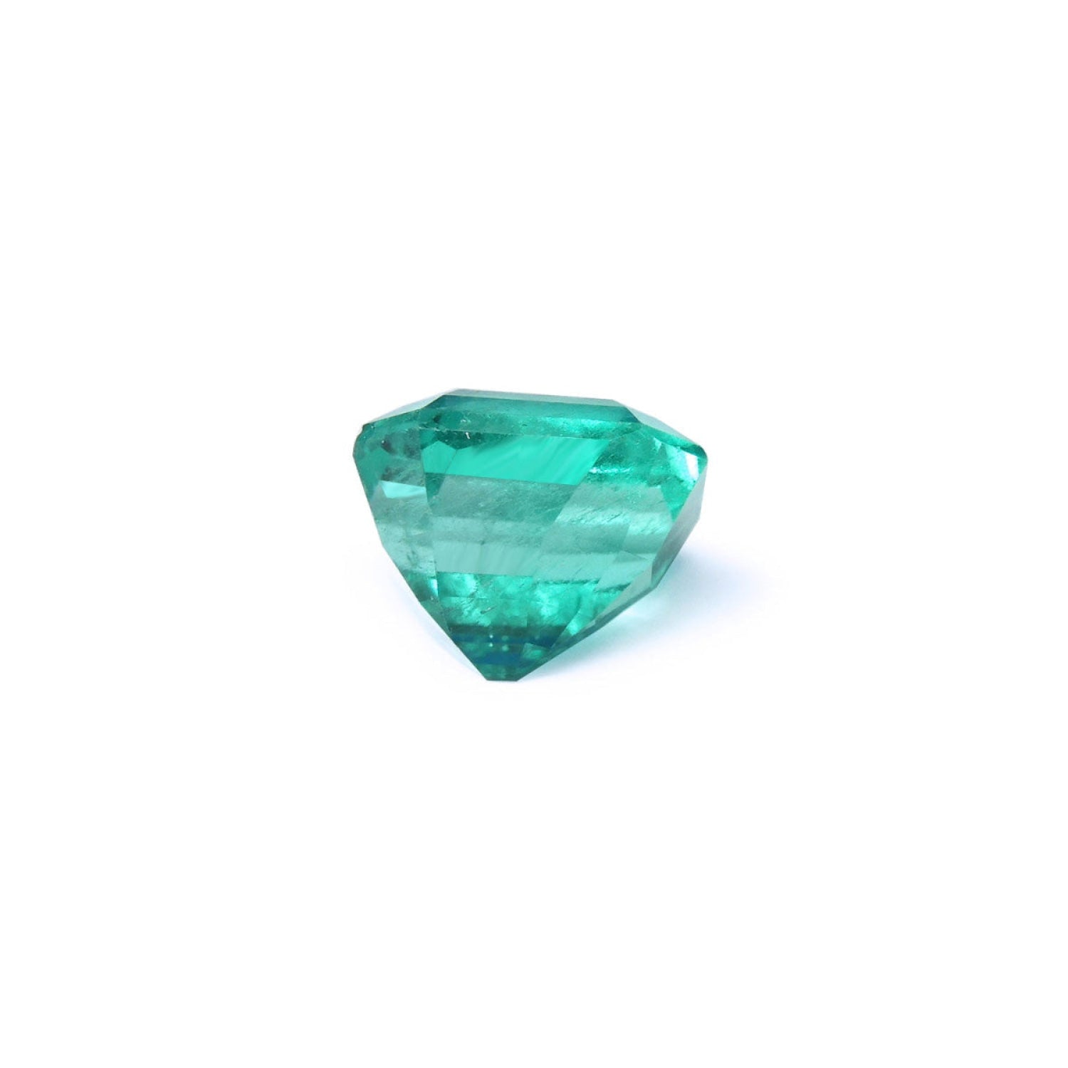 4.71 carat emerald-cut Colombian emerald with a medium bluish-green hue.