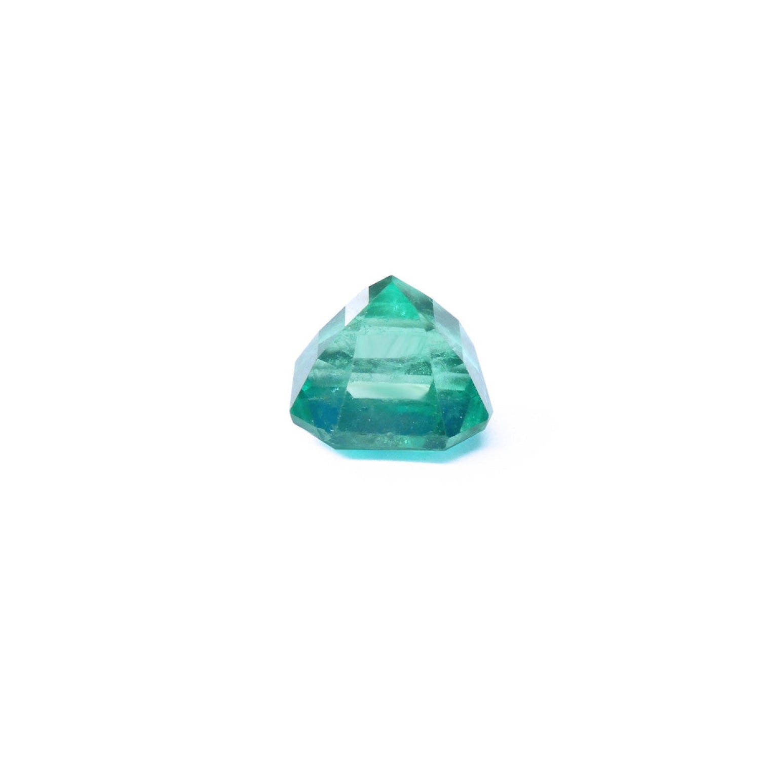4.71 carat emerald-cut Colombian emerald with a medium bluish-green hue.
