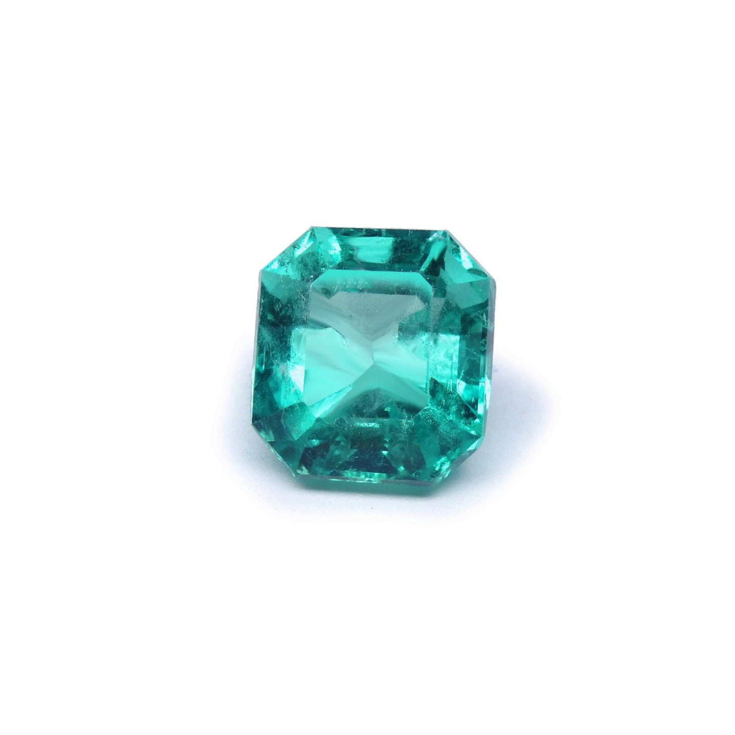 4.71 carat emerald-cut GIA certified Colombian emerald with a medium bluish-green hue.