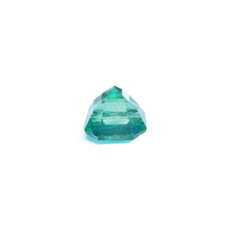 4.71 carat emerald-cut Colombian emerald with a medium bluish-green hue.