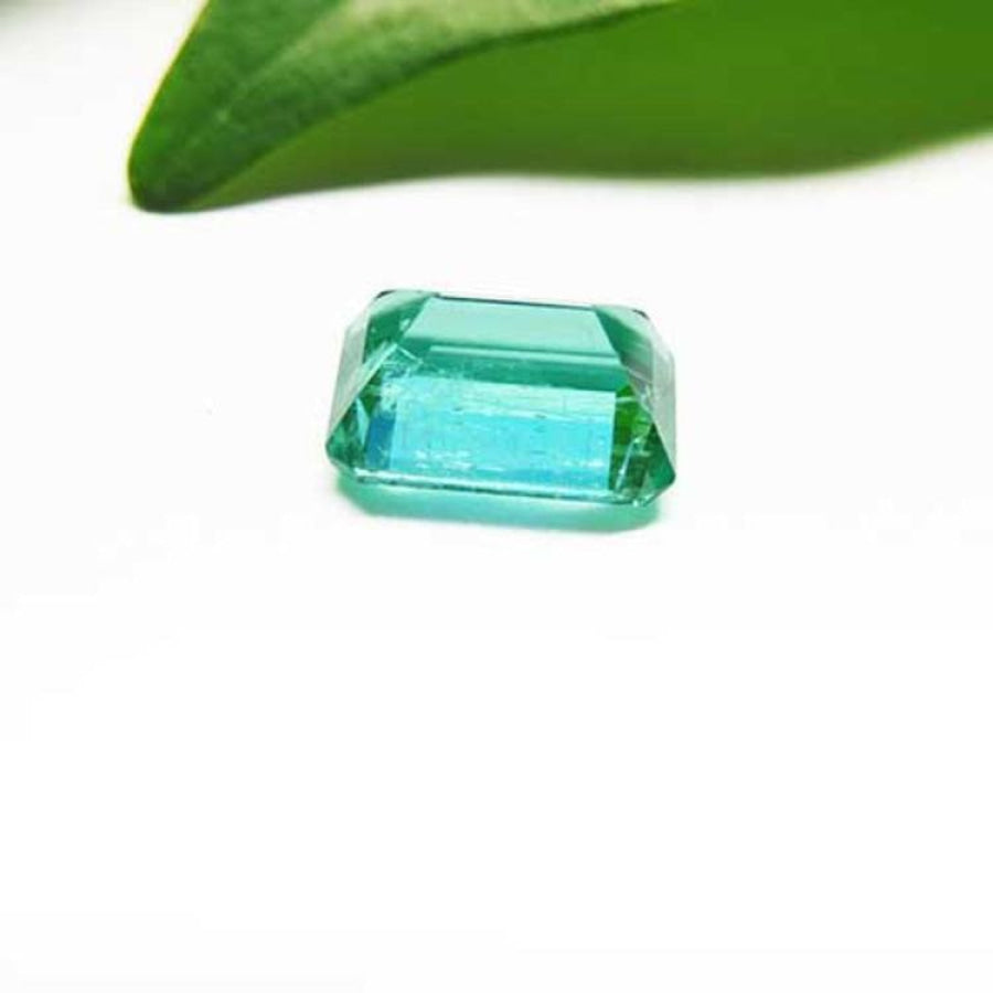 1.83 carat emerald-cut GIA certified Colombian emerald with a vibrant bluish-green hue.
