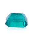 GIA certified loose emerald from Muzo mines, vibrant bluish medium-deep green, octagonal cut.