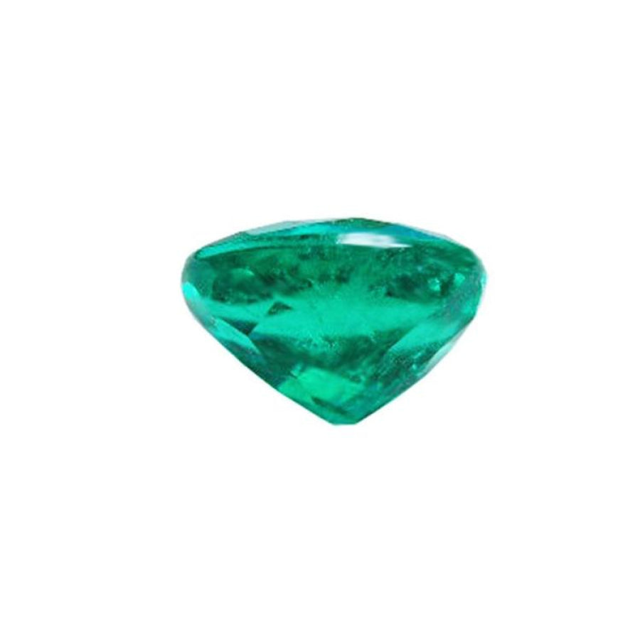 2.11 carat oval cut loose Colombian emerald, sparkling deep bluish-green.