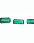 Loose emeralds matched trio set for earrings and pendant, front side tables and crowns visibles