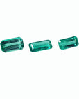 Loose emeralds matched trio set for earrings and pendant, right side tables and crowns visibles