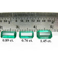 Loose emeralds matched trio set for earrings and pendant, front side with a ruler sizer