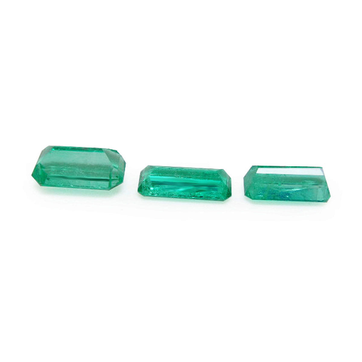 Loose emeralds matched trio set for earrings and pendant, upside down pavilions visibles
