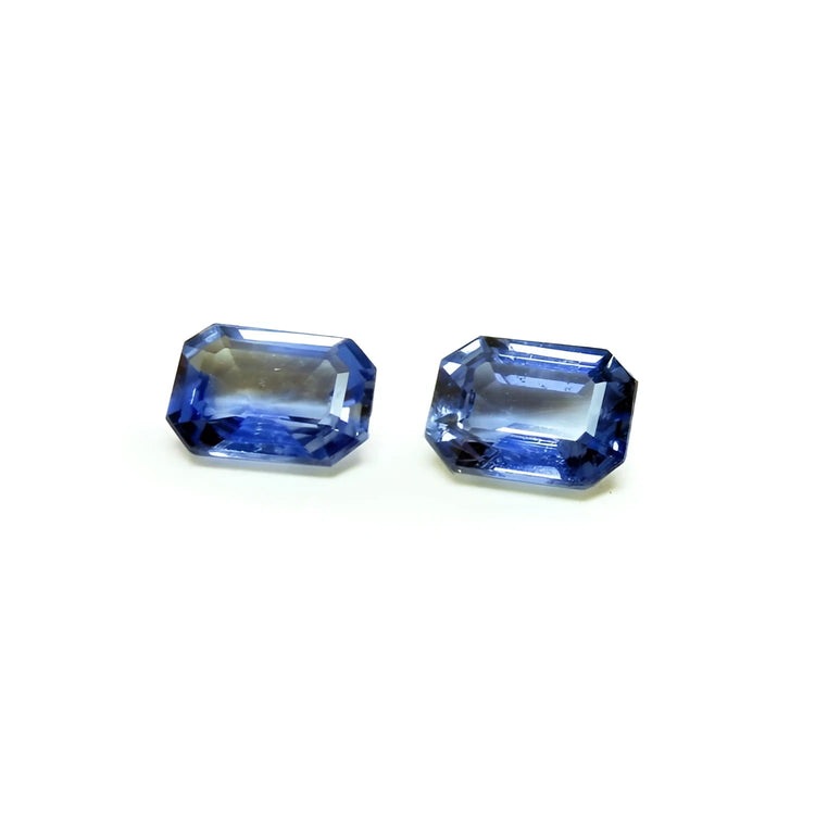 2.16 ct. Loose matching pair blue sapphires emerald-cut, crystalline medium light blue violet color, ideal for crafting elegant earrings.