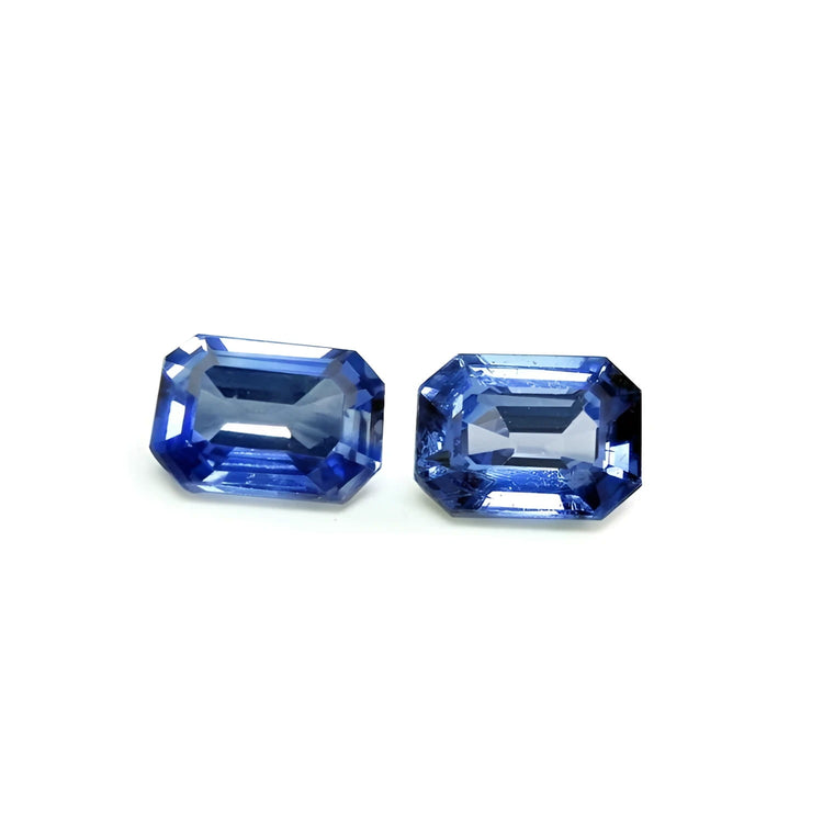 2.16 ct. Loose matching pair blue sapphires emerald-cut, matching pair, sparkling crystalline medium light blue violet color.