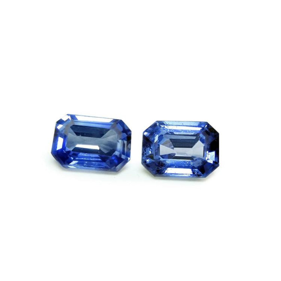 2.16 ct. Loose matching pair blue sapphires emerald-cut, matching pair, sparkling crystalline medium light blue violet color.