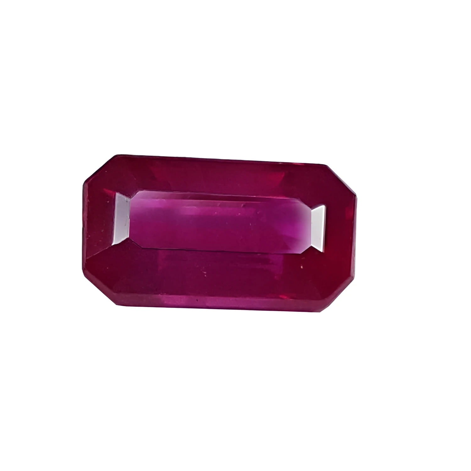 0.94 carat natural Burma ruby, emerald cut, deep red with brilliant facets.