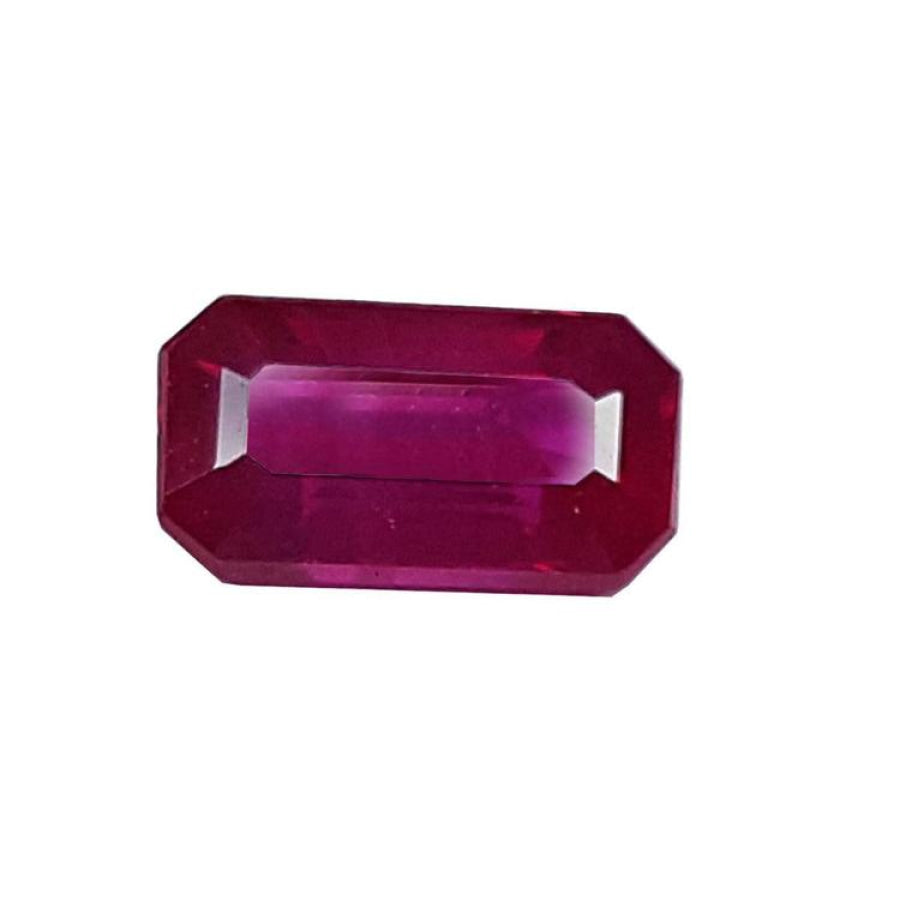 0.94 carat natural Burma ruby, emerald cut, deep red with brilliant facets.