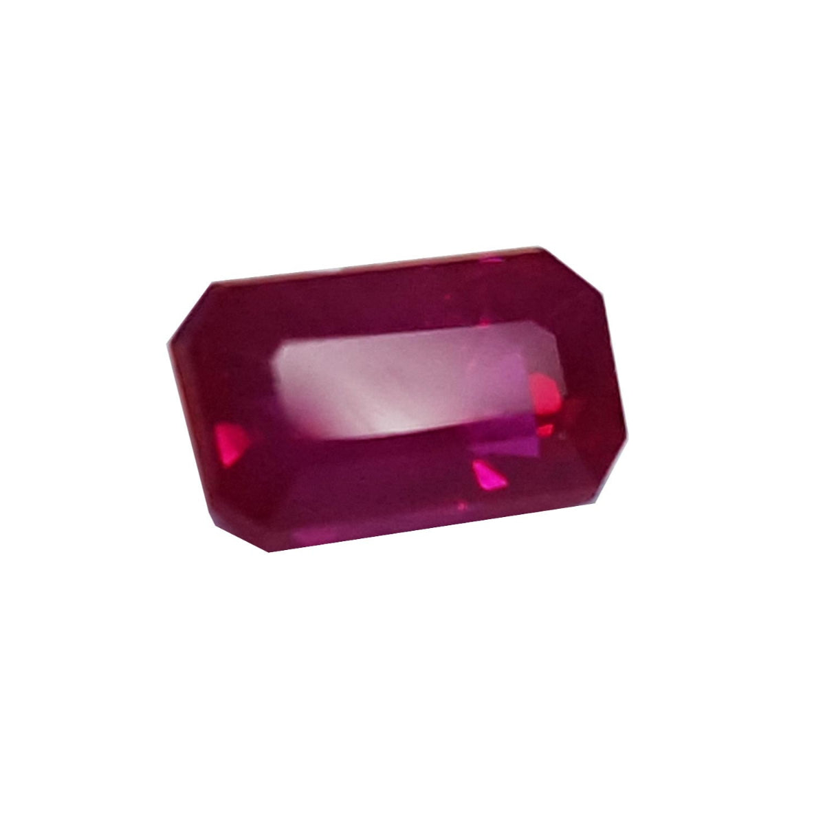 loose natural ruby emerald cut from Burma, right side position table and crown visibles