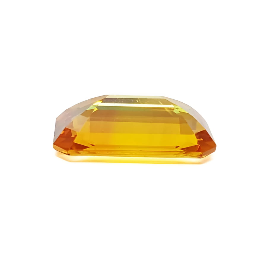 4.05 ct. vibrant intense yellow sapphire, rectangular emerald-cut loose gemstone.