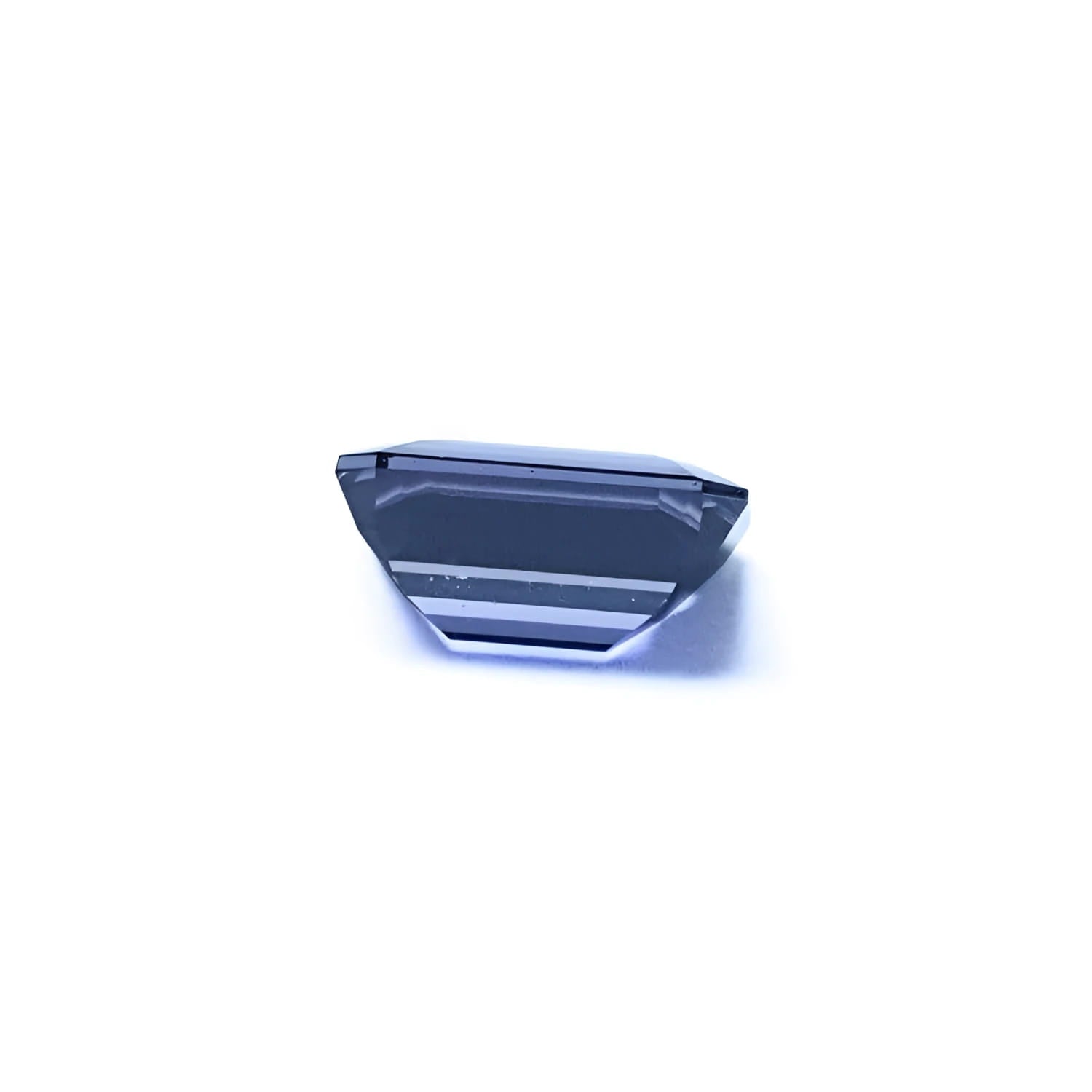 3.90 ct untreated GIA certified sapphire, rectangular emerald-cut, blue changing to purple.