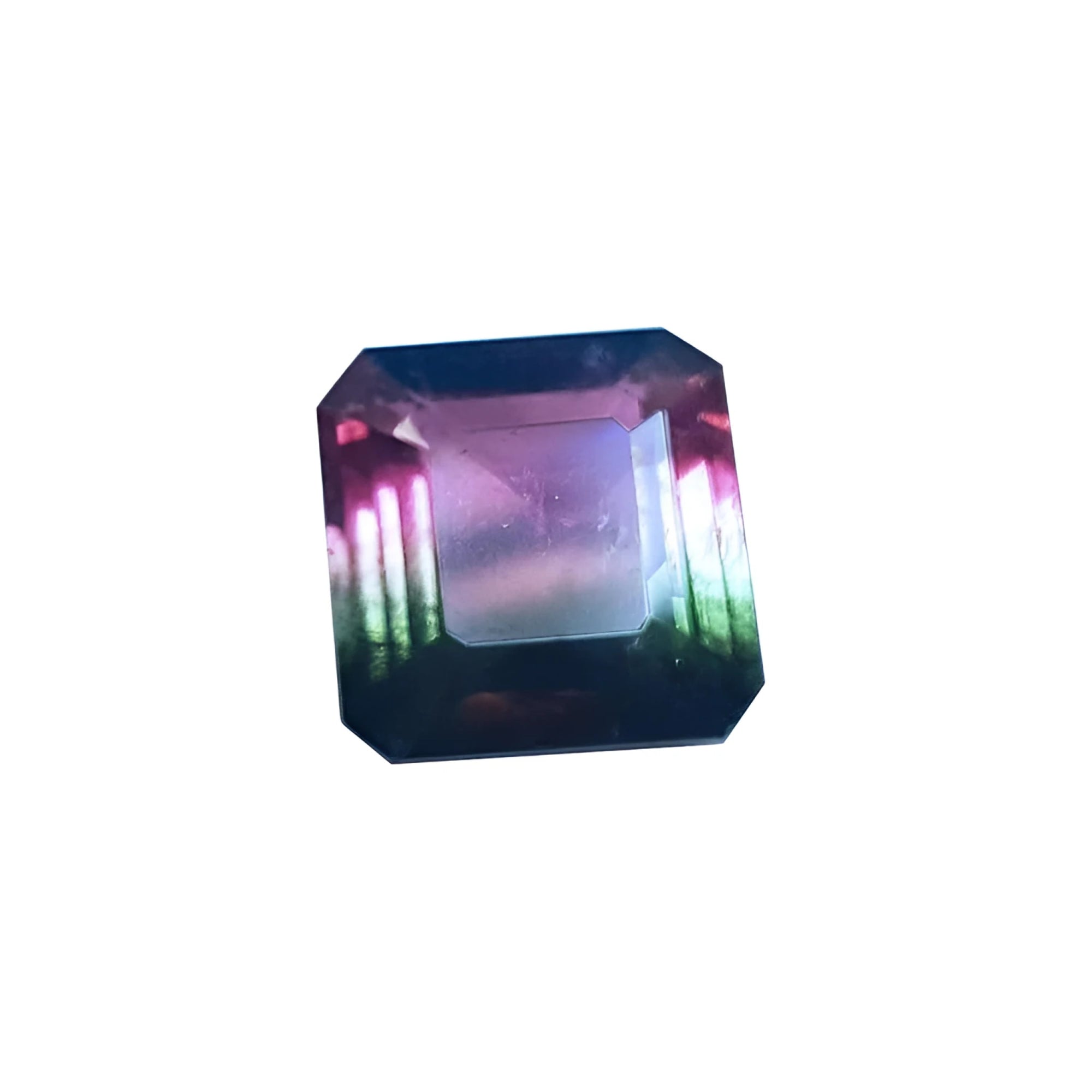 7.75 ct. emerald-cut Brazilian watermelon tourmaline gemstone with vibrant red-orange and deep bluish-green hues.