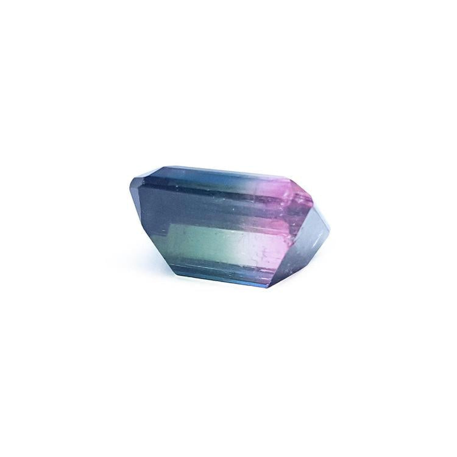 Loose 6.55 ct. emerald-cut Brazilian watermelon tourmaline, showing red, green, and blue hues.