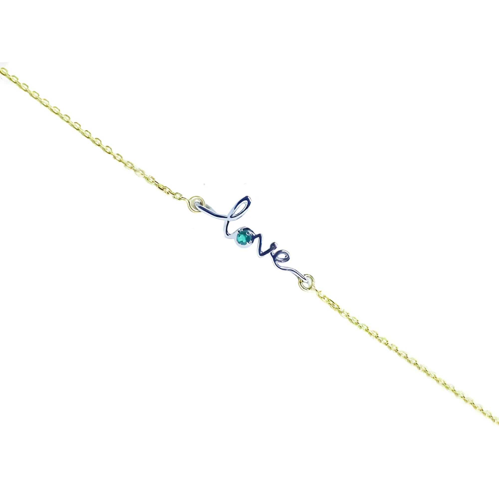 Emerald Love Bracelet: 14K yellow gold chain with "love" in white gold, featuring a round cut emerald.