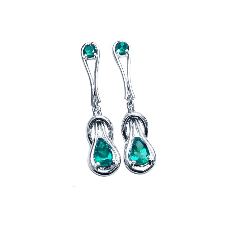 Pair of 14K white gold love knot emerald drop earrings with pear-shaped Muzo Colombian emeralds.
