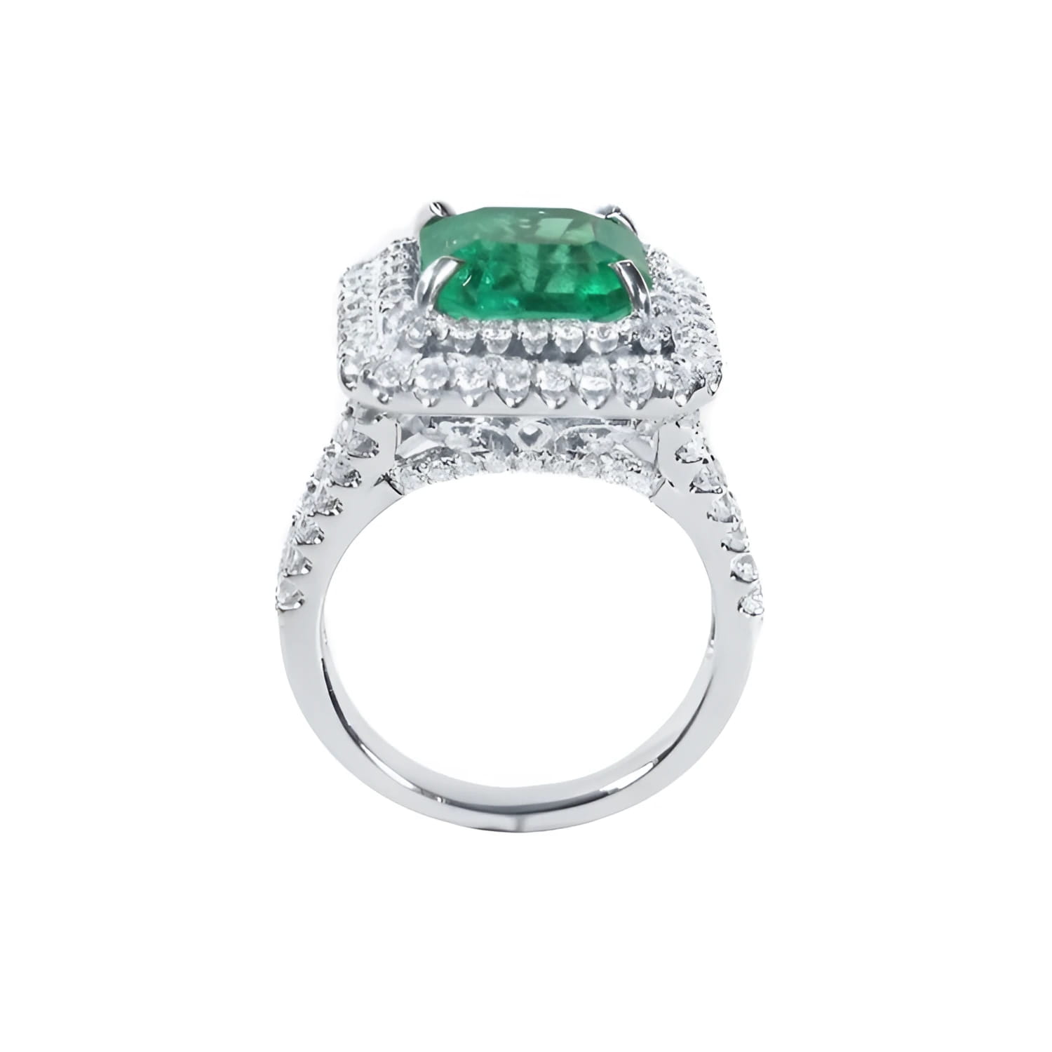 4.14 ct GIA-certified F1 Colombian emerald ring with diamond halo and band in 14K white gold.