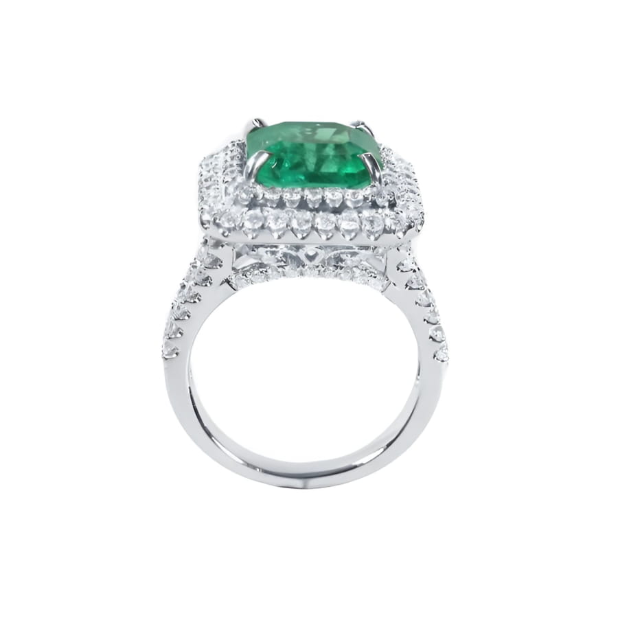 4.14 ct GIA-certified F1 Colombian emerald ring with diamond halo and band in 14K white gold.