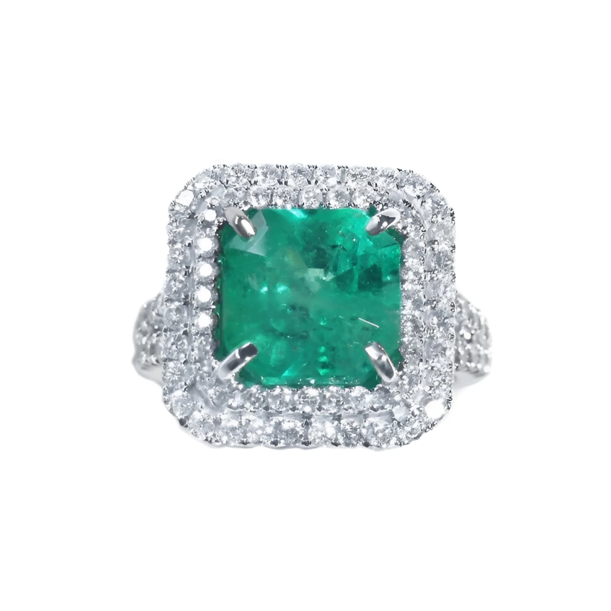 4.14 ct GIA F1 Colombian emerald ring with diamond halo and band in 14K white gold.