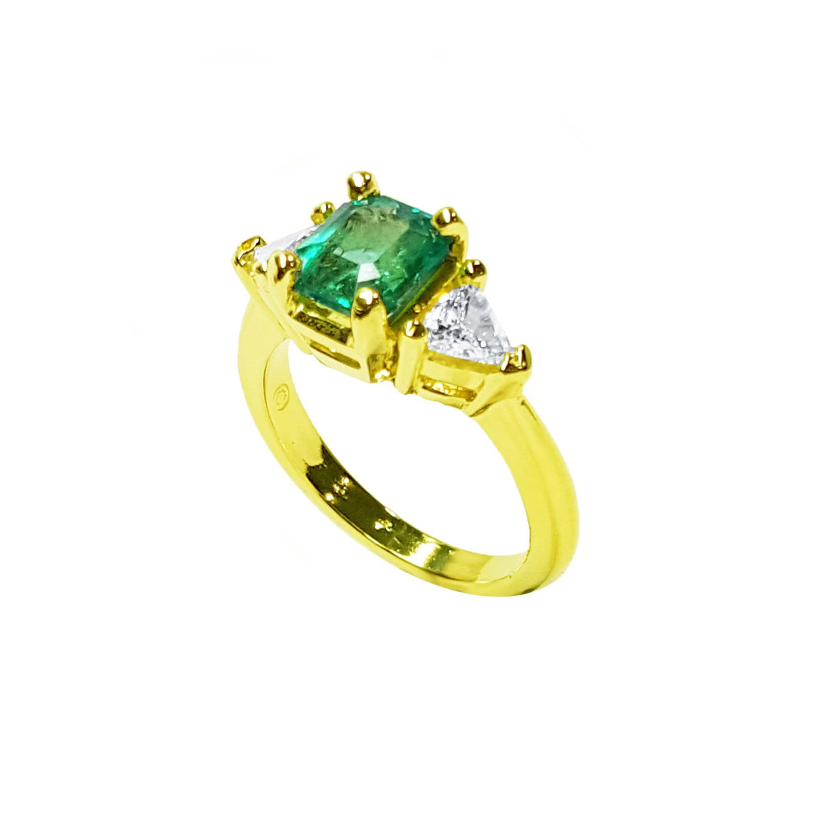 Natural colombian emerald and trillion side diamonds ring crafted in 18k yellow gold.