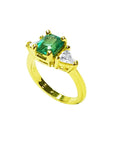 1.51 ct. emerald and trillion cut diamonds ring in 18k gold.