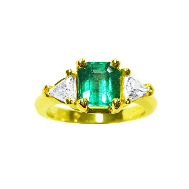 18k yellow gold emerald three stone ring for women with side trillion cut natural diamonds.