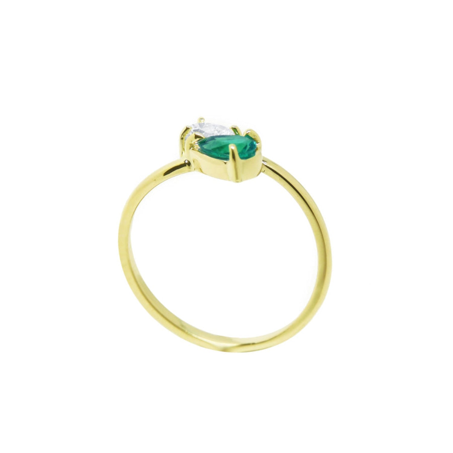 This exquisite You and Me emerald and diamond ring in the classic toi et moi style, handcrafted in 18k yellow gold.