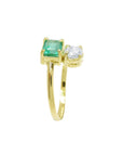 A yellow gold ring a square-cut natural emerald gemstone and a round-cut diamond, set in 18k.