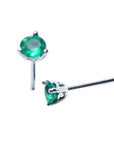 A pair of white gold martini stud emerald earrings, top and side profile's view.