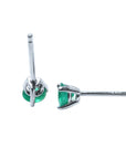 A pair of Colombian emerald martini stud earrings, upside down underside push backs view
