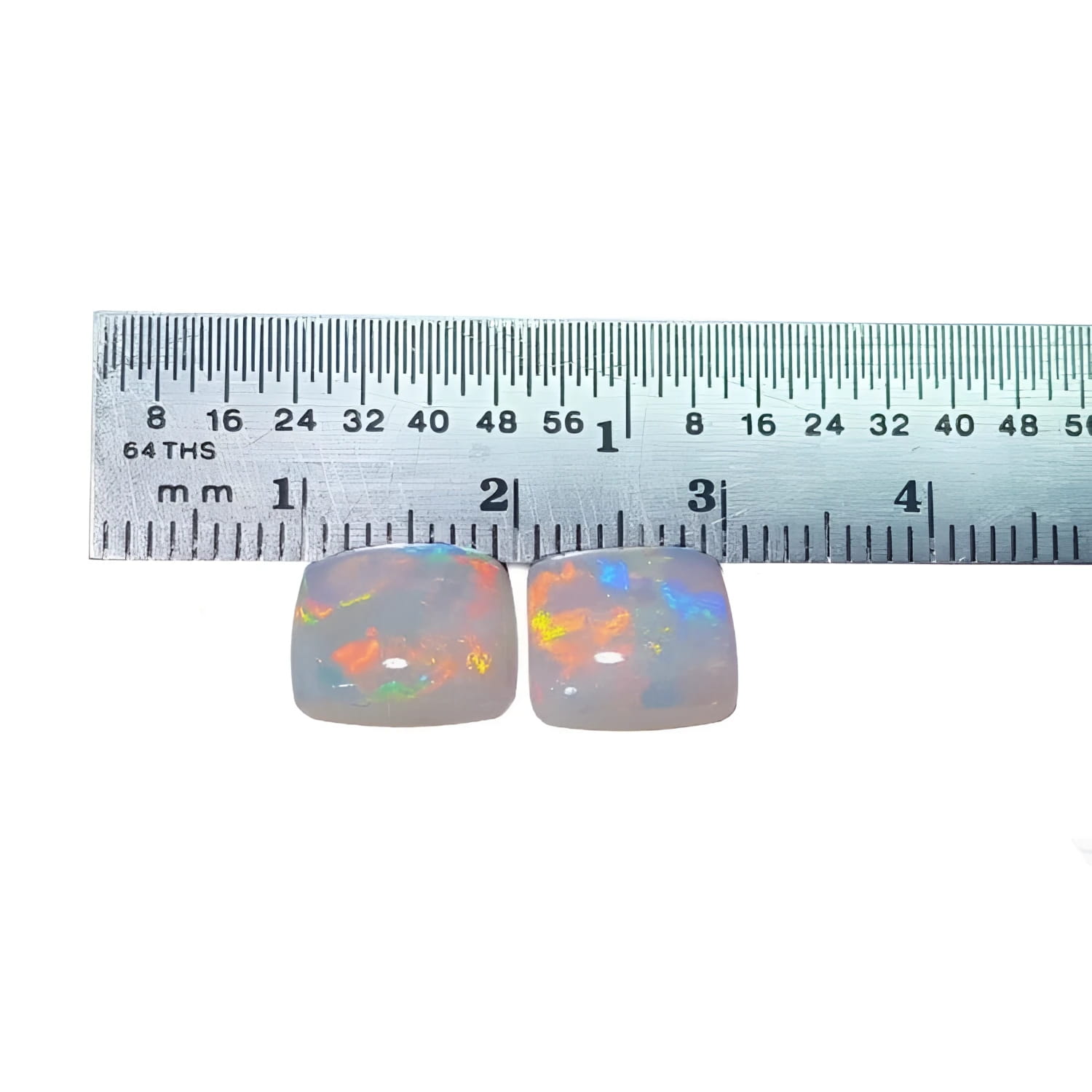Pair of 5.45 ct. solid Australian square cut opals with multicolor flash, predominantly red-orange.
