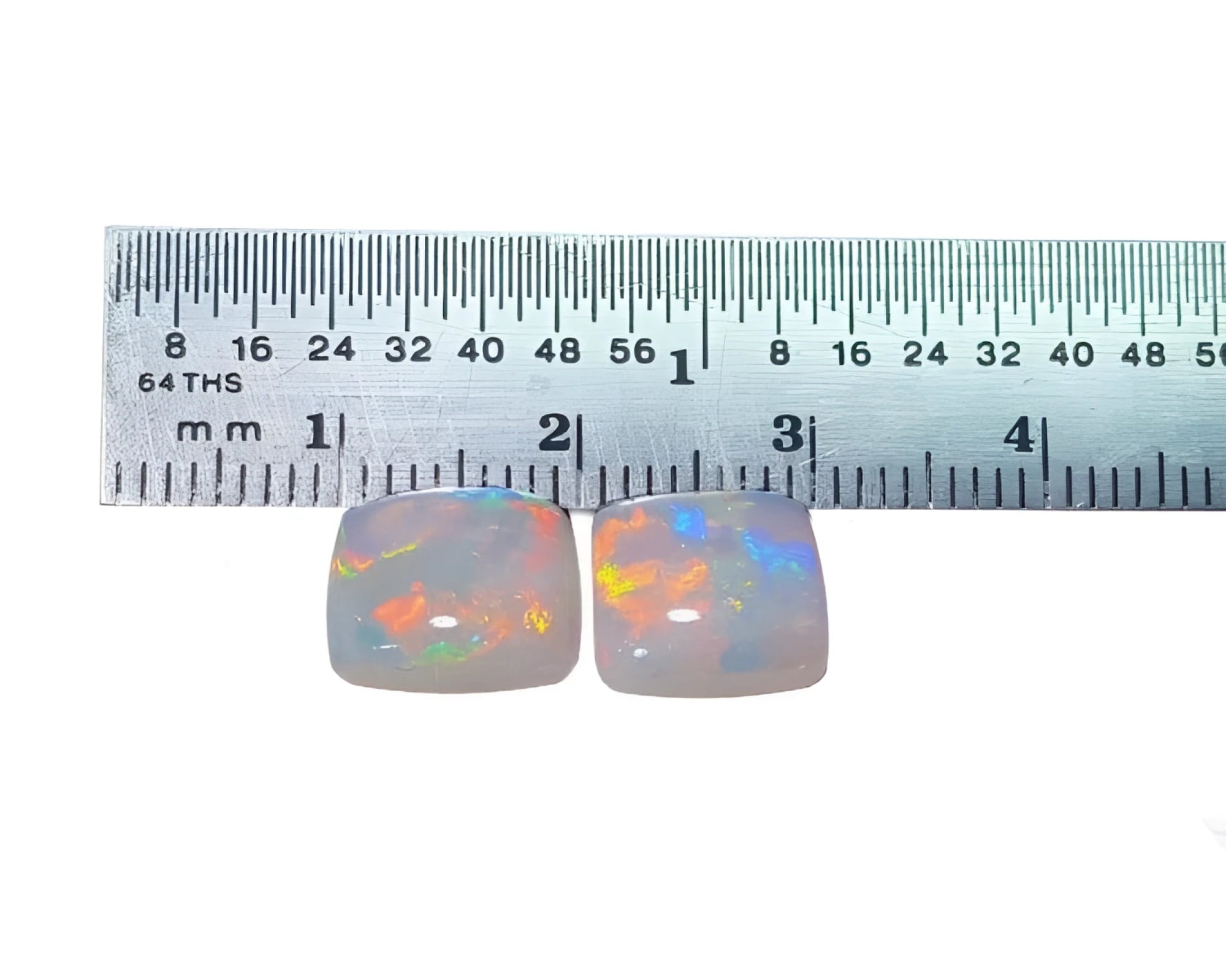 Pair of 5.45 ct. solid Australian square cut opals with multicolor flash, predominantly red-orange.