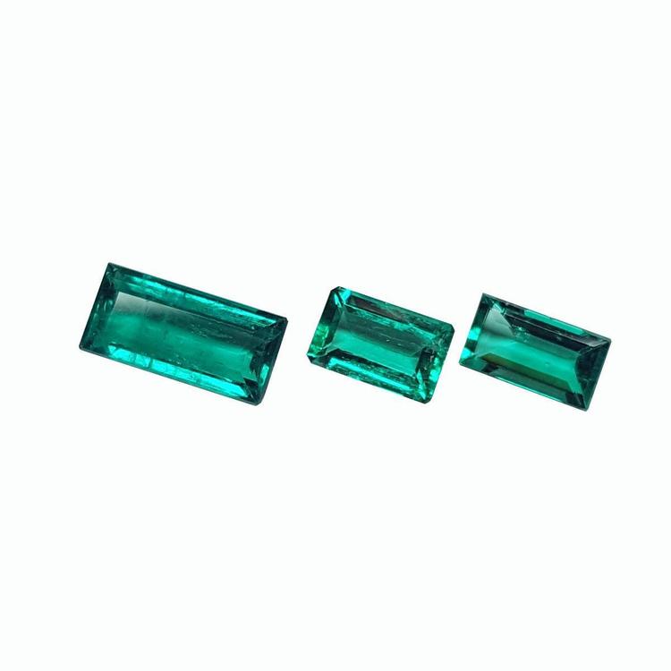 Matched trio set natural loose colombian emeralds bluish green color fine quality from the Muzo mines.