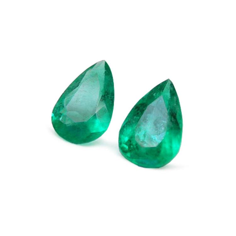 Matched pair of 3.62 carat pear-cut bluish-green Colombian emeralds for earrings.