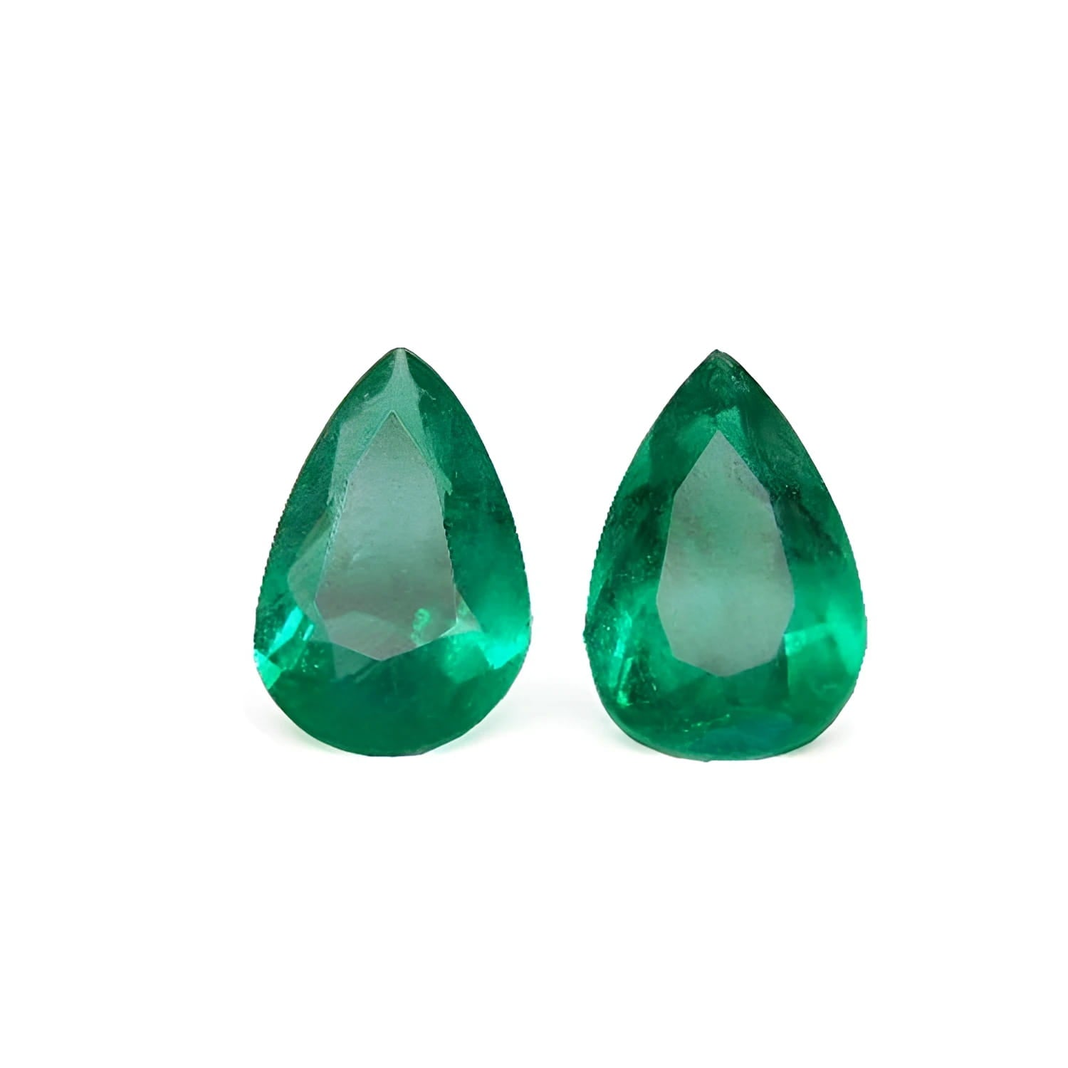 Matched pair set loose emeralds pear cut 3.62 ct. with a bluish-green tone.