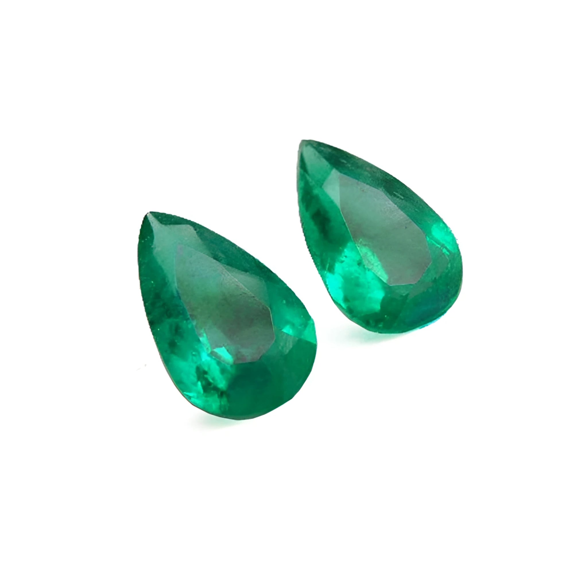 Matched pair set loose emeralds pear cut for crafting high-quality earrings at a competitive price.