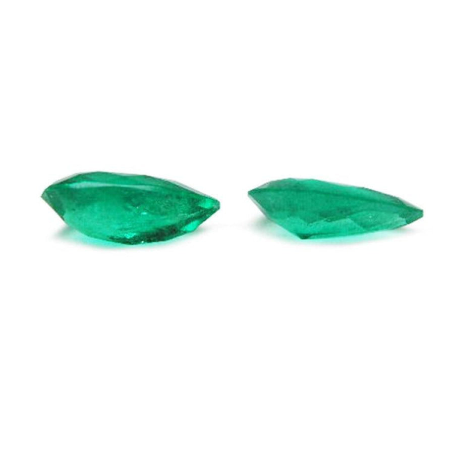 Matched pair of 3.62 carat natural bluish-green pear-cut Colombian emeralds.