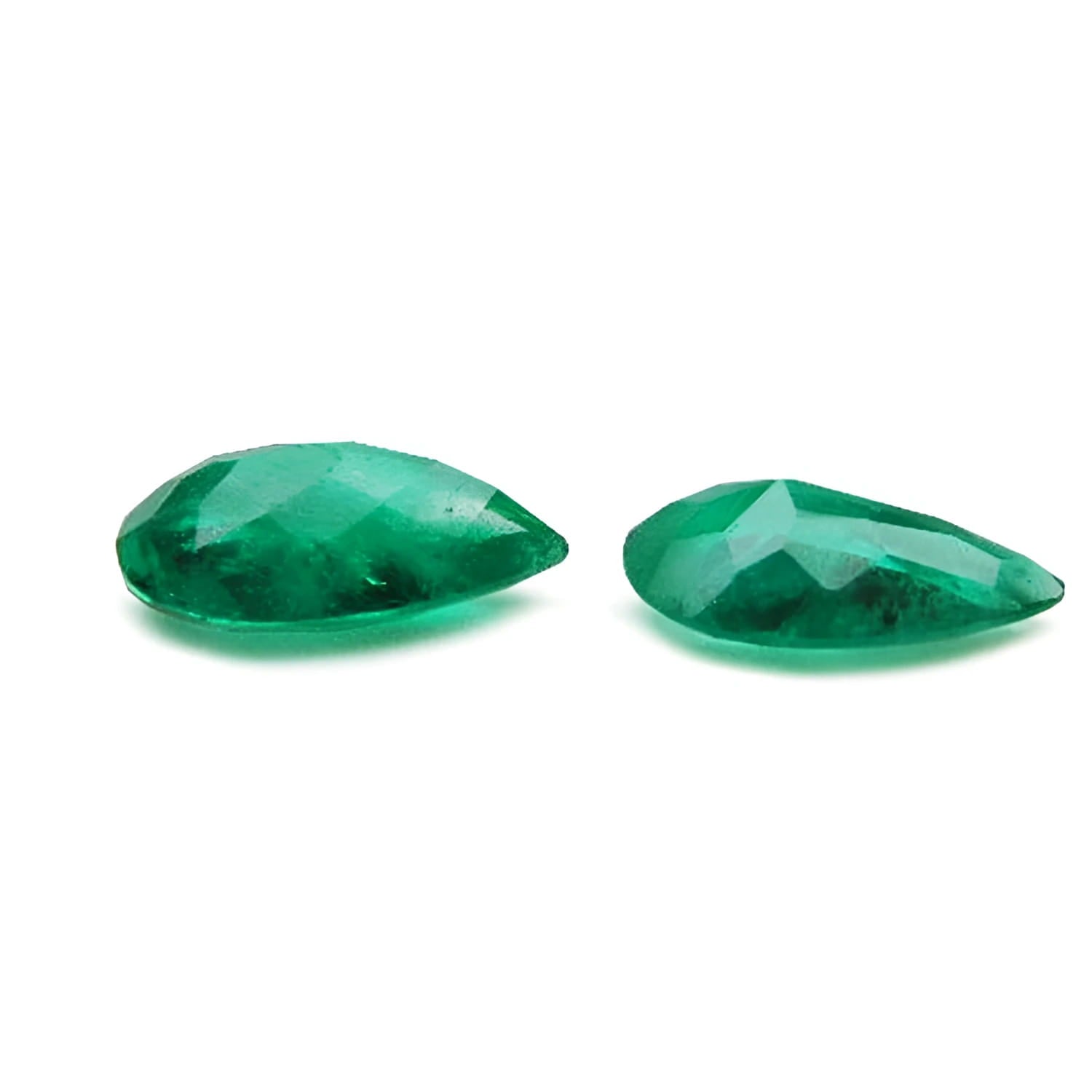 Matched pair of 3.62 carat pear-cut bluish-green Colombian emeralds.