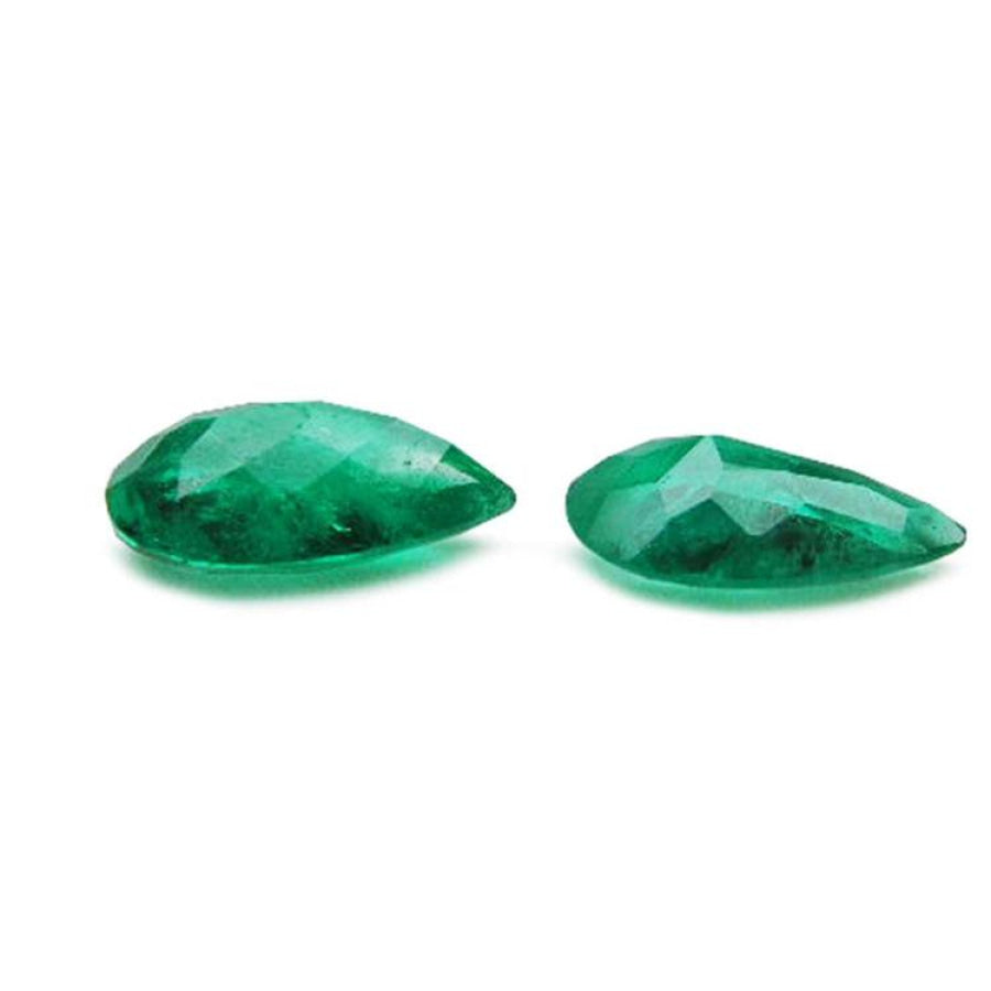 Matched pair of 3.62 carat pear-cut bluish-green Colombian emeralds.