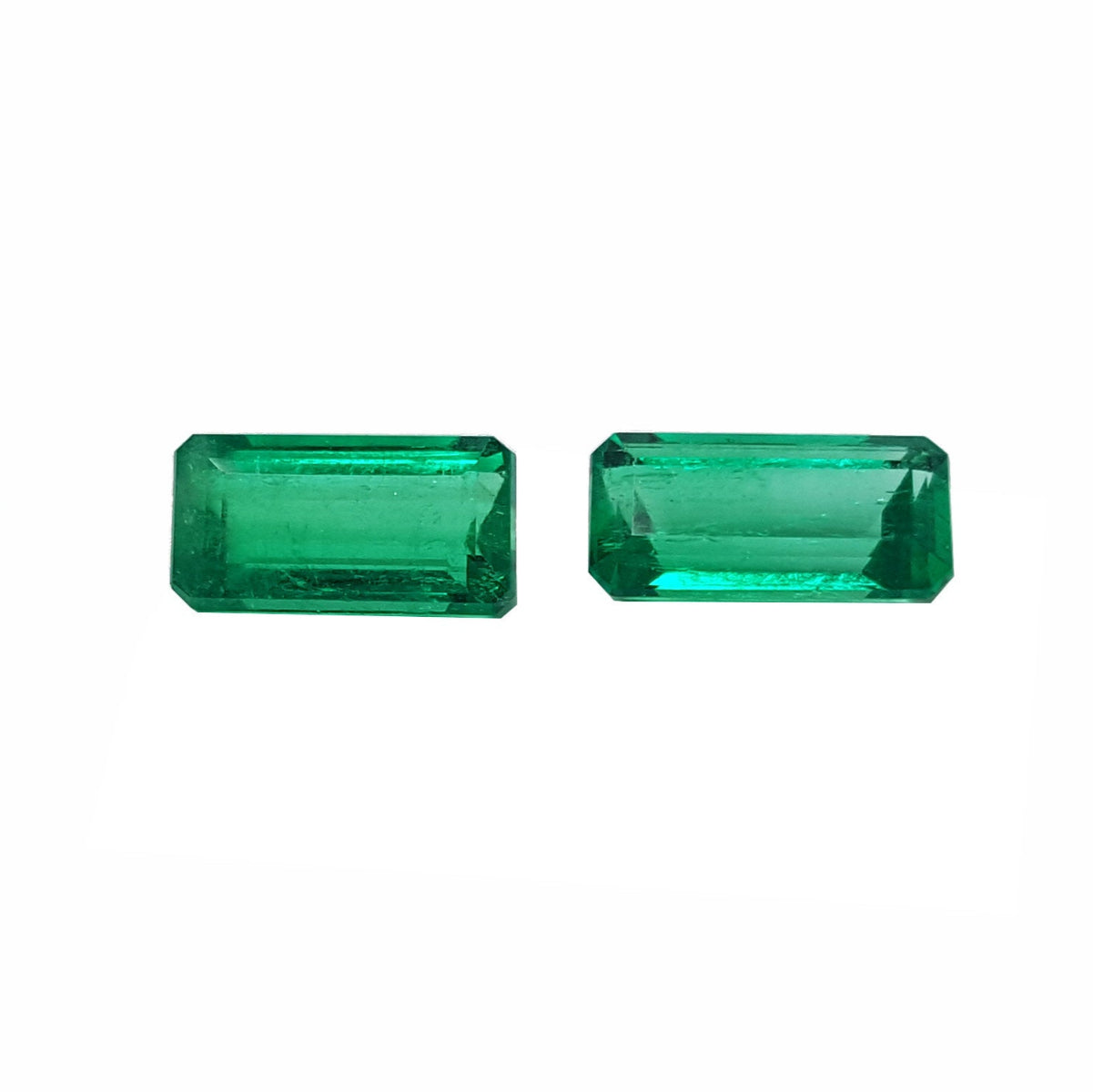 Matching pair natural loose Colombian emeralds