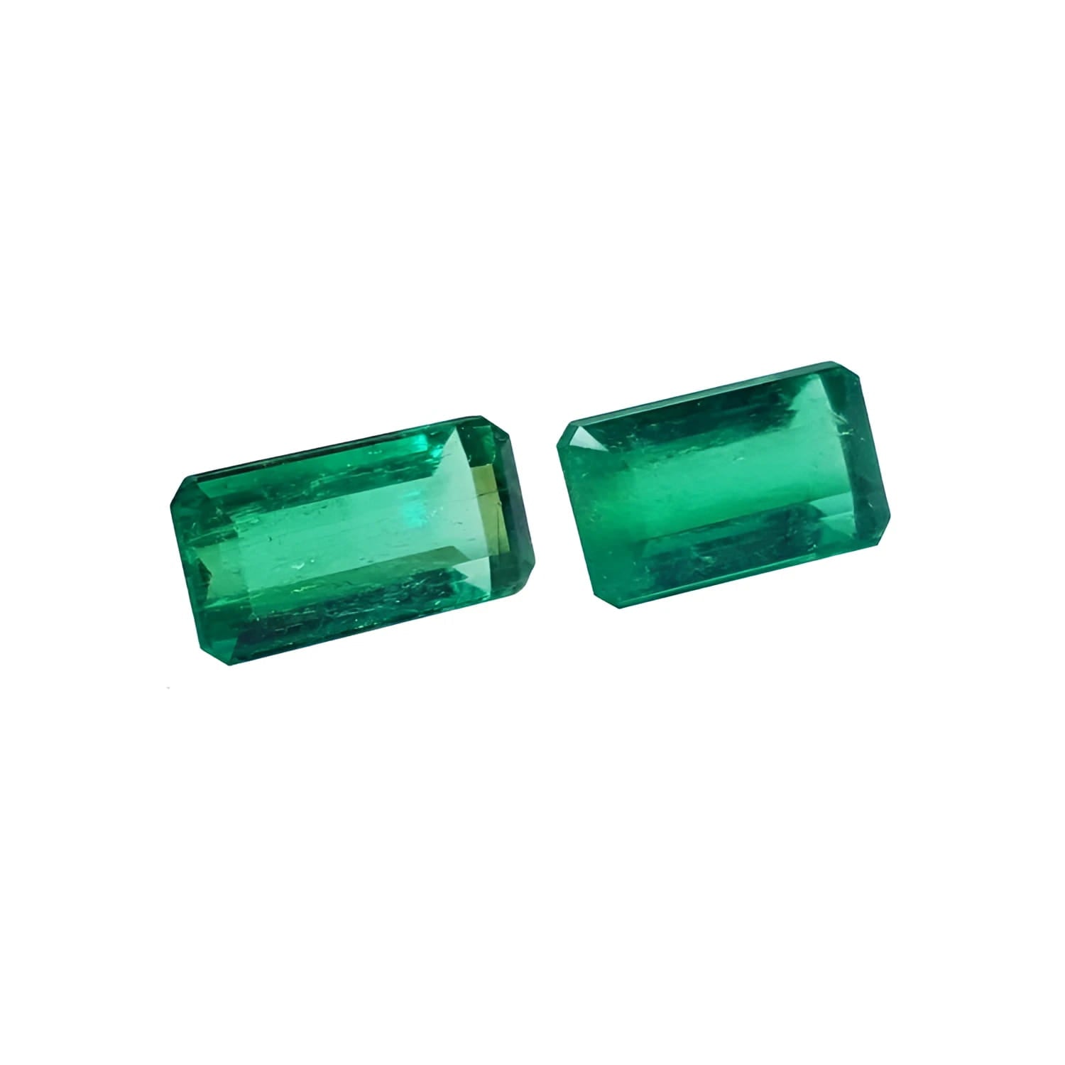 Matched pair of 2.08 ct. natural emerald-cut green emeralds from Muzo mines.